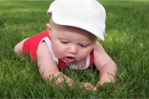 cute baby lying on the grass